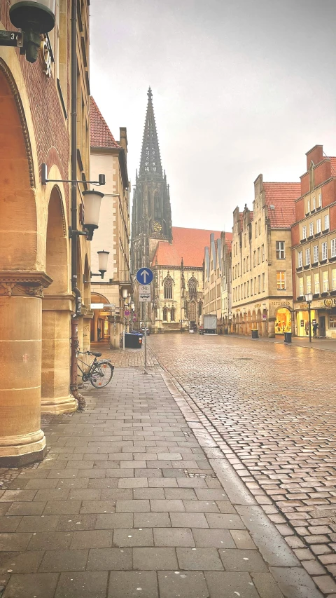 a street with old buildings that have been turned into cobblestone