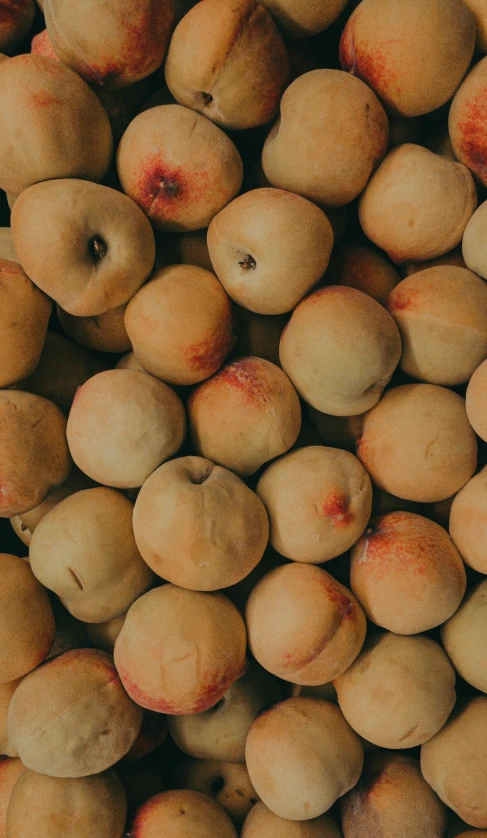 a pile of some kind of peaches piled together