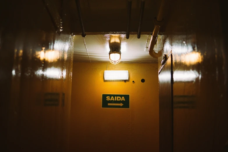 a hallway with two lights on the ceiling