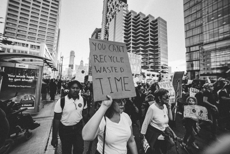 protesters march down the streets protesting against cuts on water supplies