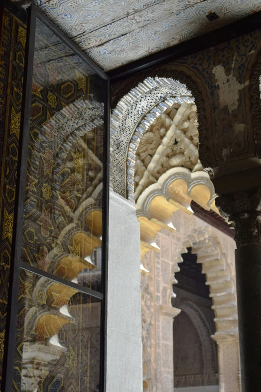 ornate carvings adorn an intricately designed wall in a building