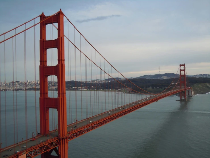 a picture of the view of a bridge that is orange