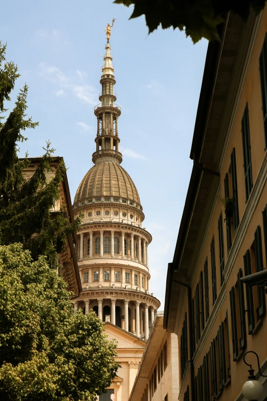 a very tall dome like building towering over the town