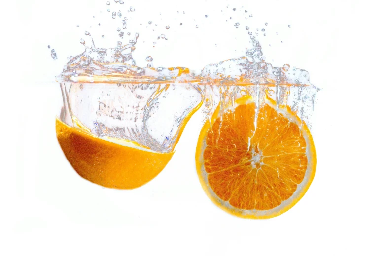 an orange wedge in the water on a white background