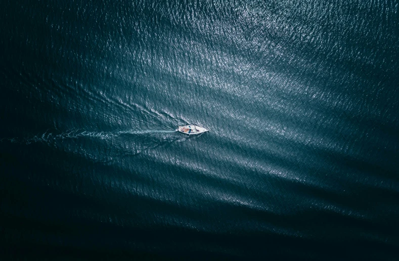 a boat in the middle of a lake