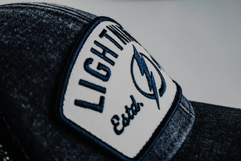 the back of a levi clothing hat with a patch