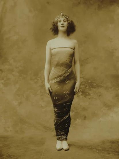an old time po of a woman dressed as a mermaid