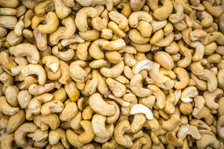 some nuts are stacked up together together on display