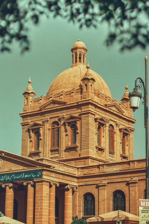 an old building has a clock on the top