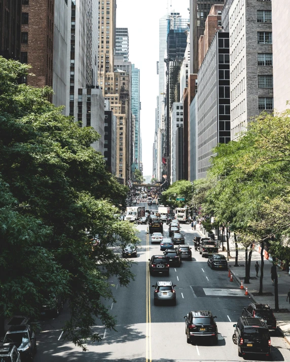 a street with cars going up and down the hill