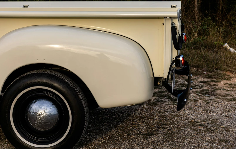 closeup of a white vintage truck at dusk