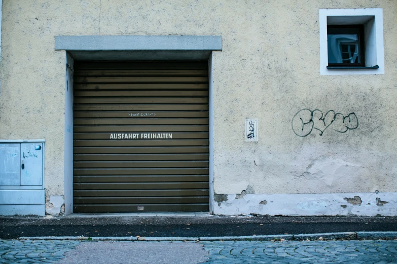 the door is open on the side of a building