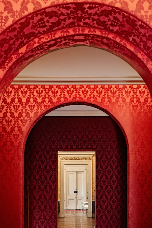 an archway to the second floor of an old building