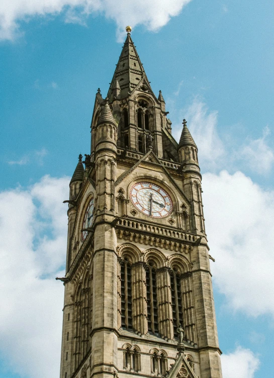 this is the top of the building with a clock