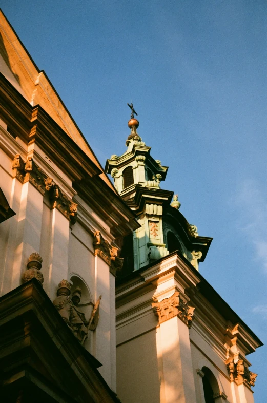 an old clock tower towering above a building