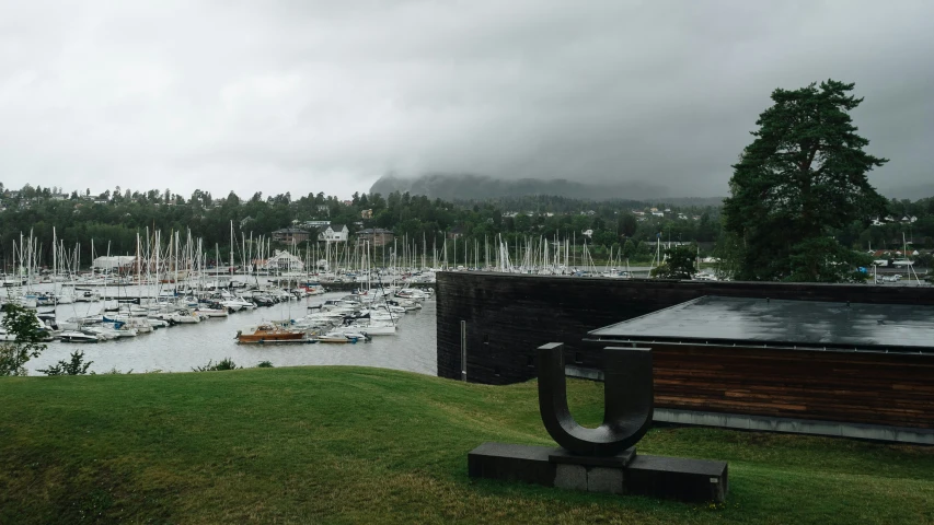 a bunch of boats are parked at a marina