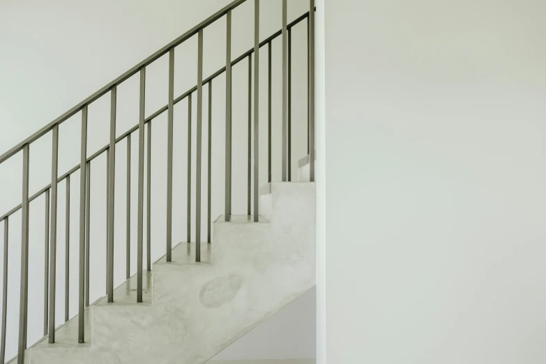 an open stairwell with the stairs painted white