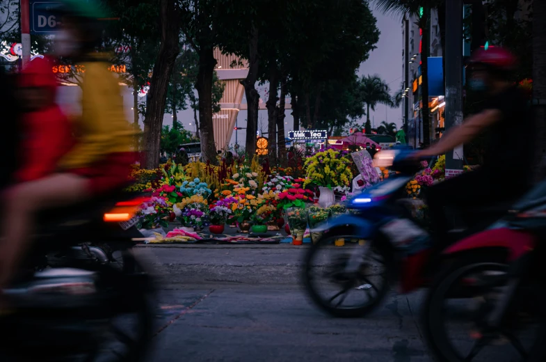 a man on a motorcycle drives down the road