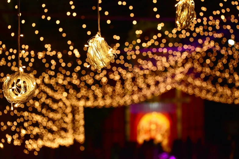 many light bulbs with decorations around them