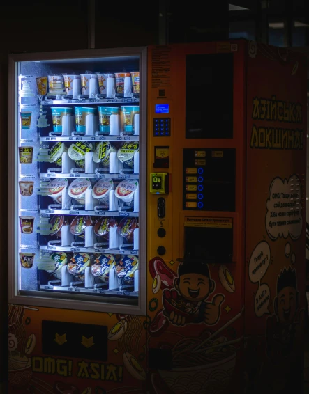 a vending machine sitting next to a building