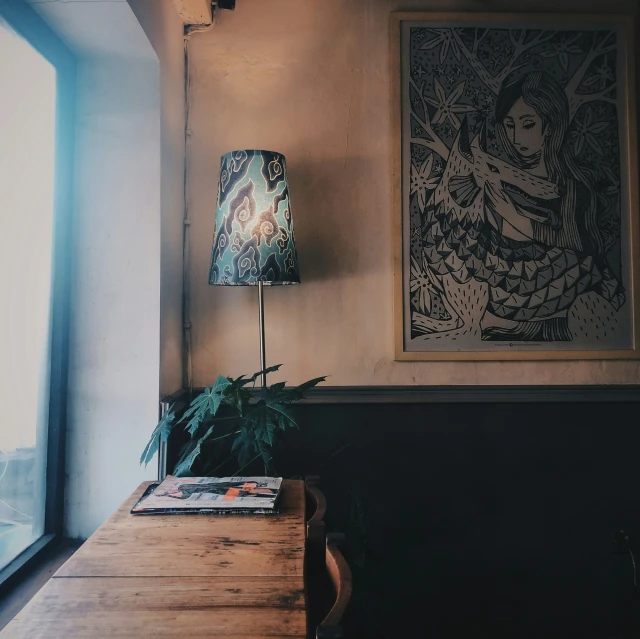 the picture is of a painting and a plant