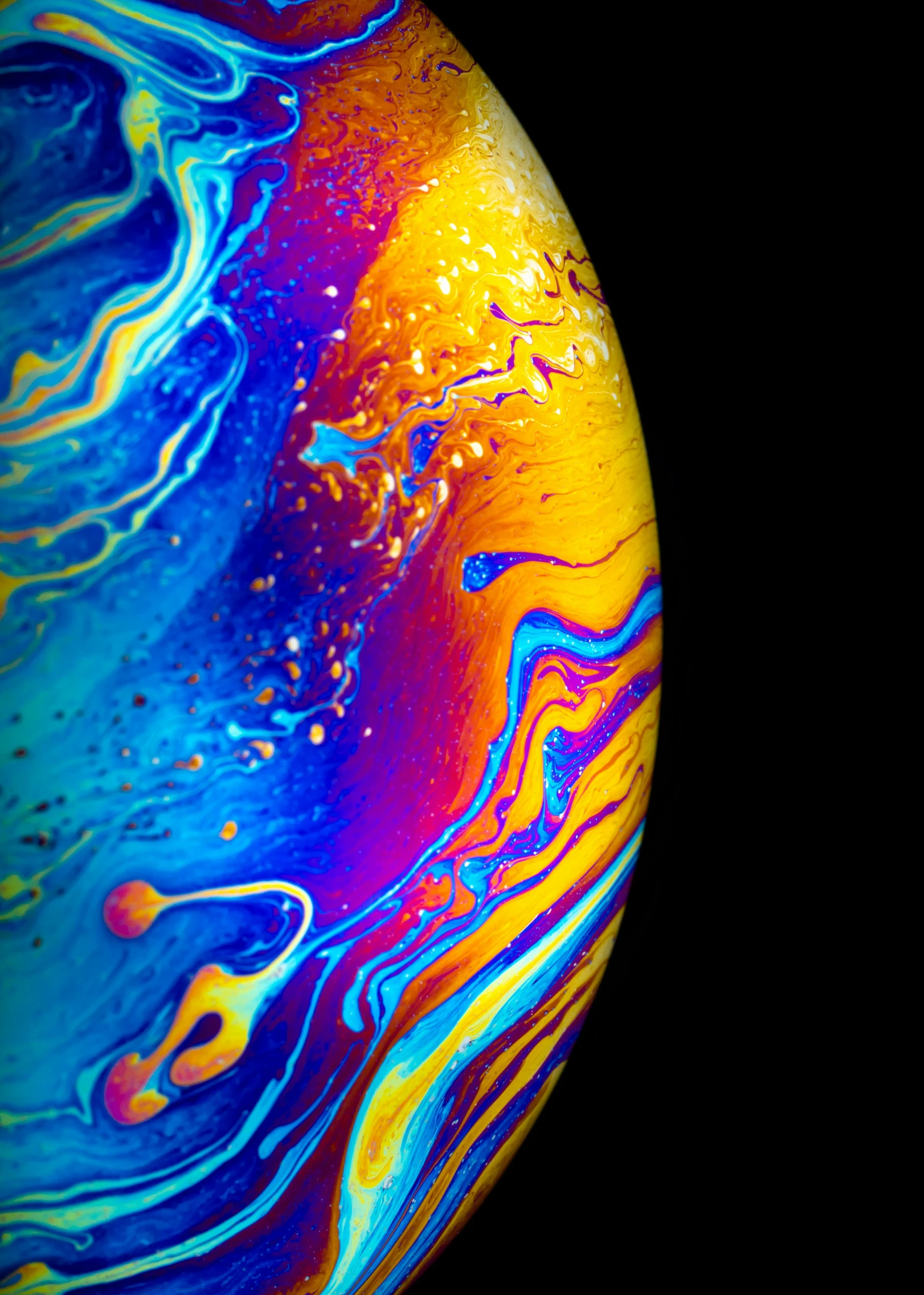 colorful, swirling pattern on a black background