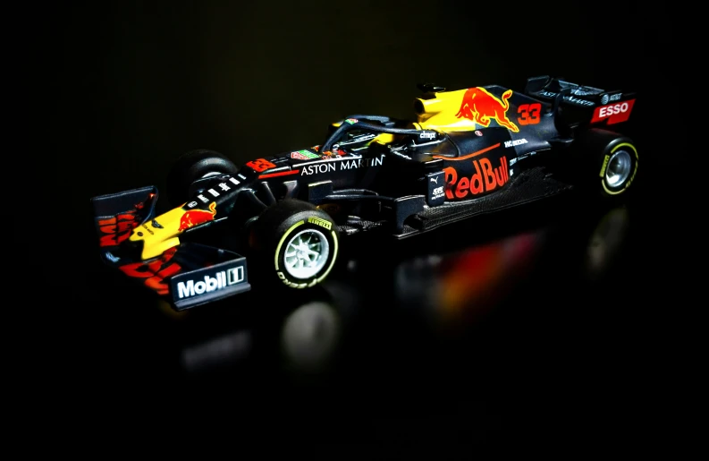 red bull, red bull race car on a black background