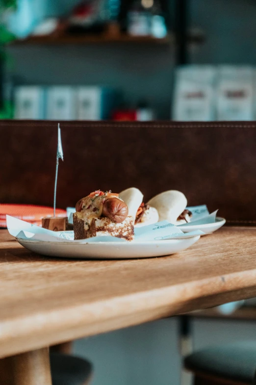 a small white plate with some food on it