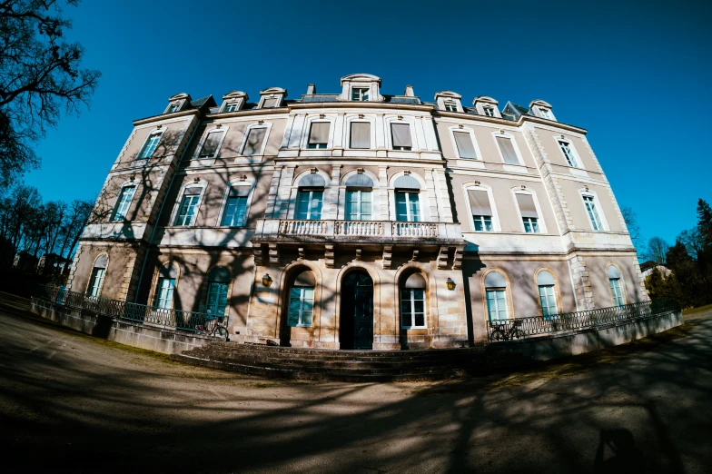 an old building with balconies and a clock