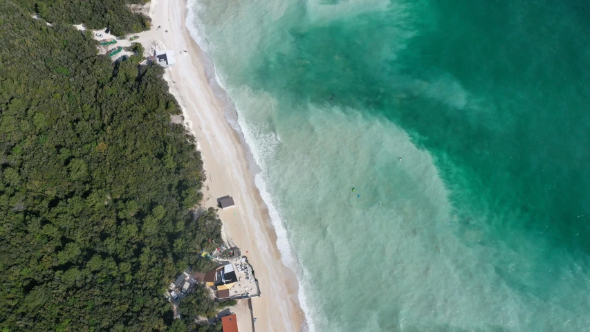 a view from a very high angle looking down at the beach