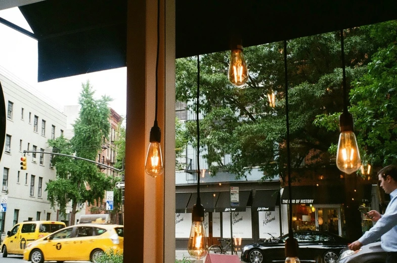 a view of an outdoor cafe and street