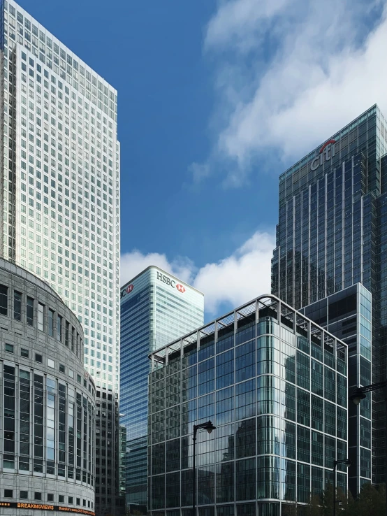 a group of large buildings near a body of water