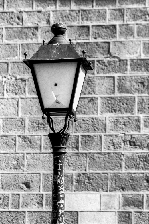 a black and white po of a street lamp