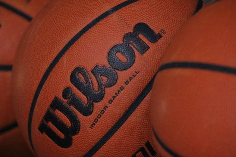 a group of orange basketballs with the word baron written on them