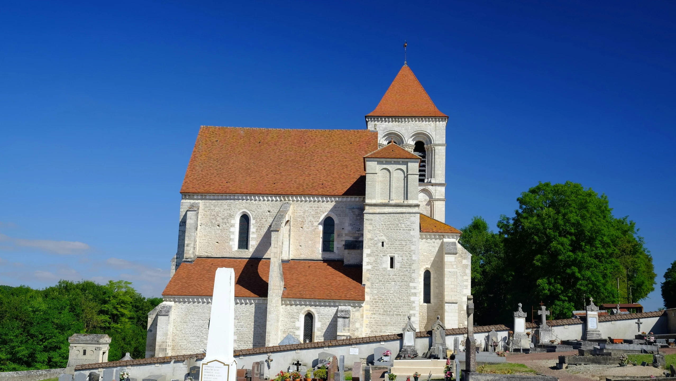 a large church with a massive white tower