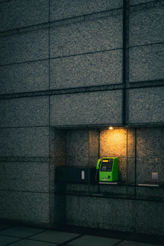 the reflection of a table lamp on the window of a wall