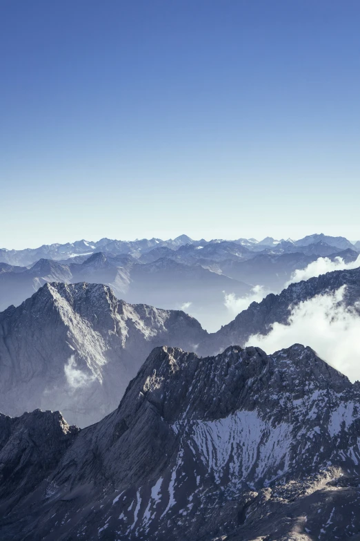 a po taken from the top of a snow - capped mountain range