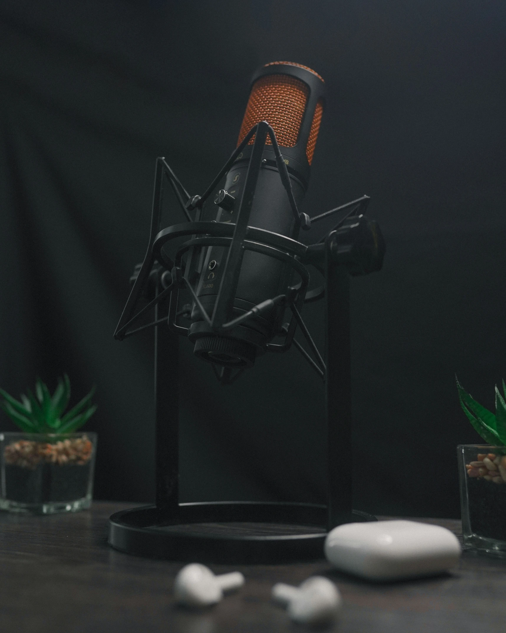 an old fashioned microphone sits on a table