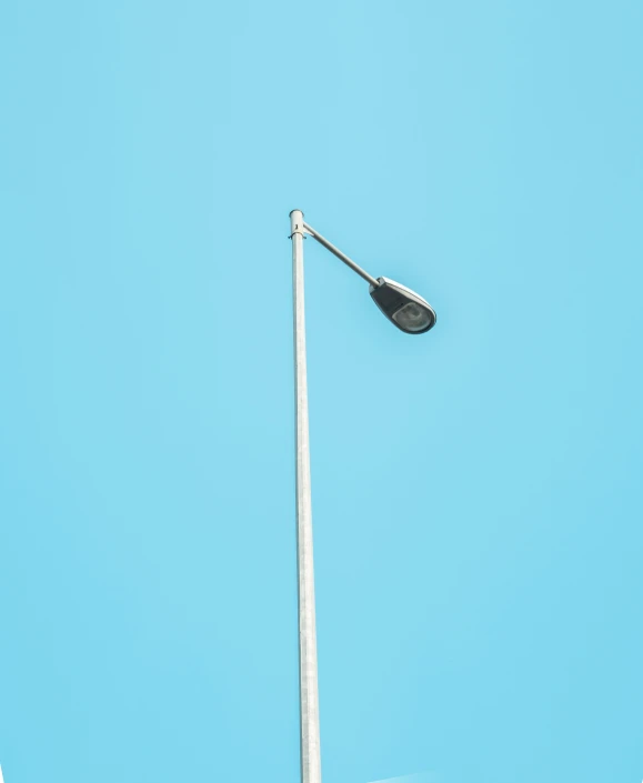 there is a light on the side of a pole