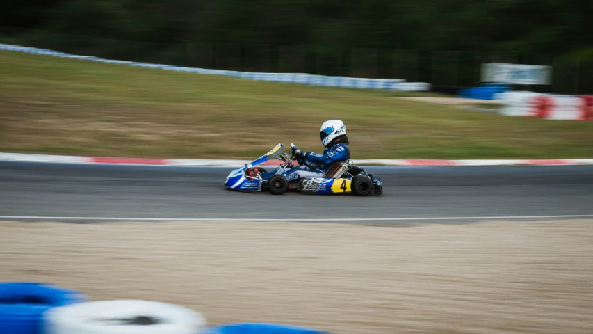 two people racing on a track during a competition