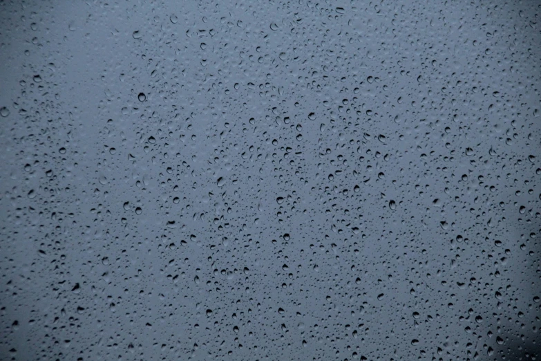 a po of a rainy window with water drops