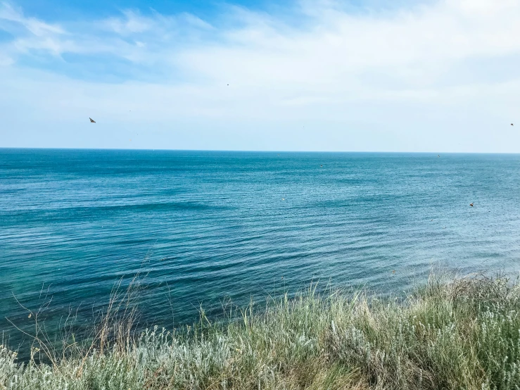 the ocean and land at the shoreline are very beautiful