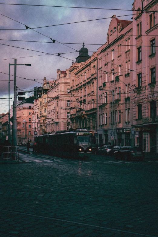 a picture taken of a city street with cars driving on it