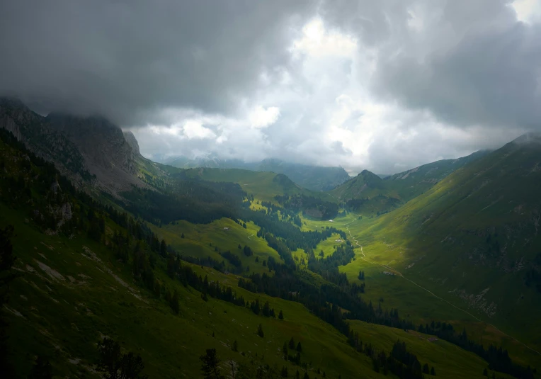 the clouds are in a dark and stormy sky