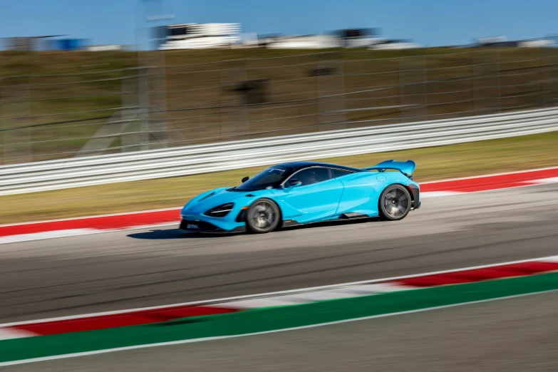 a racing car moving along a racetrack