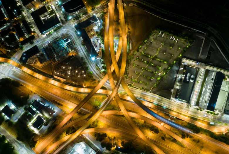an aerial s shows a city intersection at night