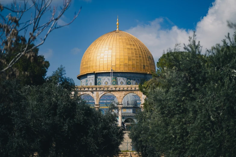 a dome on the top of a large building