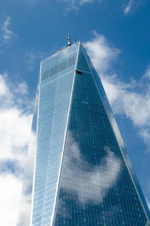 looking up at the roof of a very tall building