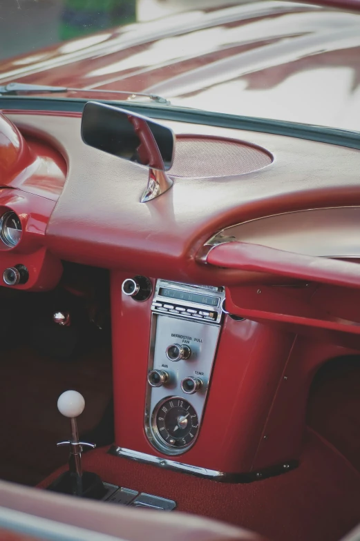 a close up s of the interior of a vintage car