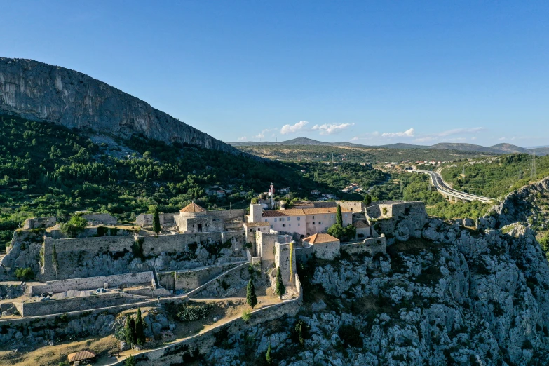 a view of an old castle in the middle of nowhere